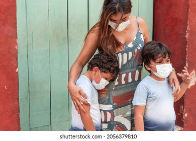 Family With Protective Mask In The Street