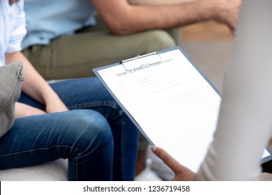 Family Psychologist Reading Information About Patient Close Up, Holding Clipboard With Medical Card, Doctor Listen To Patient Talking About Problem, Counselor Making Notes During Therapy Session