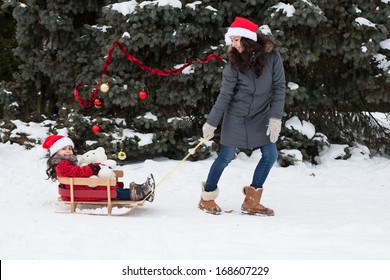 Family Pulling Sleigh