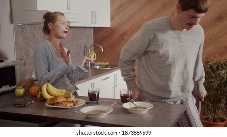 Family Quarrel Between Husband And Wife. Relationships Within A Young Family.The Young People Had A Fight At Dinner And The Husband Left The Table.