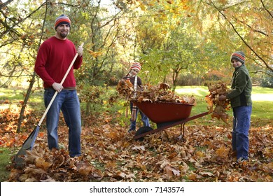 Family Raking Leaves