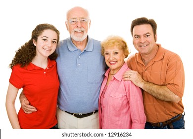 Family Ranging In Age From Teen To Seniors, Isolated On White Background.