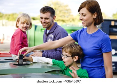 A Family Recycling A Mobile Phone