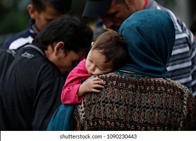 A Family Of Refugees Rest In Victoria Square, Where Migrants And Refugees Stay Temporarily In Athens, Greece On Sep. 22, 2015.