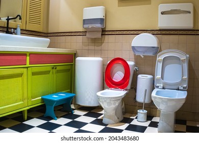 Family Restroom. Toilet Bowl For Child And Adult.