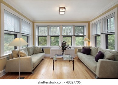 Family Room In Condo With Wall Of Windows