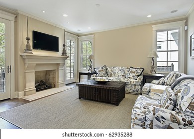 Family Room In Luxury Home With Fireplace