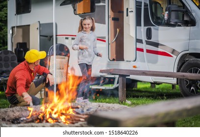 Family RV Road Trip Campsite. Caucasian Family. Father with Daughter Having Fun in Front of Campfire. Recreation Vehicle Traveling. - Shutterstock ID 1518640226