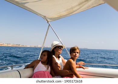 family, sailing on a yacht