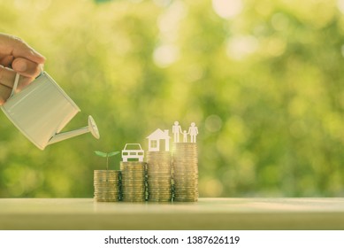 Family saving plan for basic needs concept : Water being poured on rows of rising coins with green sprout, car / auto model, a house or home, family members, depicts investing money for earning growth