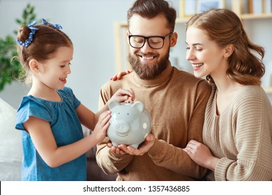 Family Savings, Budget Planning, Children's Pocket Money. Family With Piggy Bank Moneybox 
