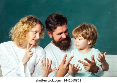 Family School. Woman And Man Helps The Child Boy. Happy Family. Kids At Preschool. Parent Taking Child To School. Family School. School Community Partnership