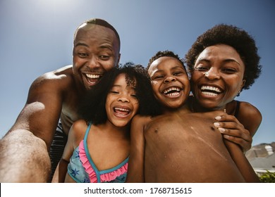 Family selfie outdoors. Man taking selfie with his family on summer holidays. - Powered by Shutterstock