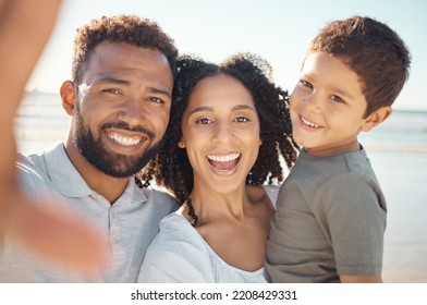 Family Selfie Portrait At Beach Holiday, Summer Vacation And Seaside Relaxing Together. Faces Of Excited, Smile And Happy Mom, Dad And Boy Kids Taking Photos For Fun, Happiness And Sunny Ocean Travel