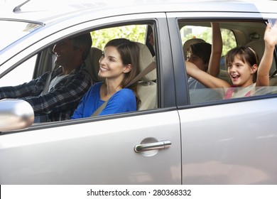 Family Setting Off On Car Journey