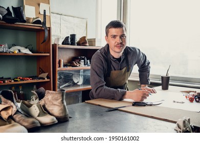 In A Family Shoe Shop A Young Apprentice Works With Paper To Create A Pattern For Shoes