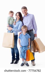 Family With Shopping Bags On A White Background