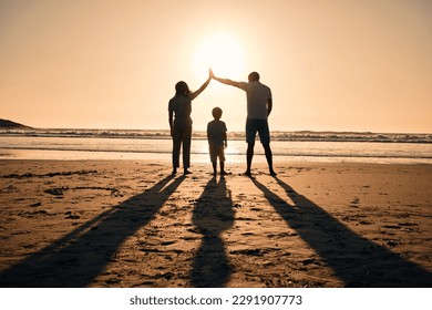 Family silhouette at beach, protection and sunset with people, safety and security with parents and child outdoor. Mother, father and kid in nature, back and ocean view with love, care and support - Powered by Shutterstock