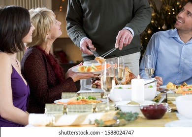 Family Sitting Down Christmas Dinner Stock Photo 1588024747 | Shutterstock