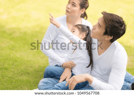 Similar – Mother playing with her daughter on the grass