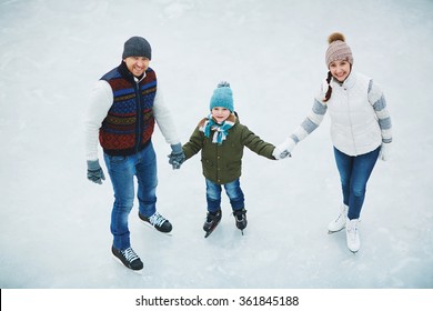 Family In Skating Rink