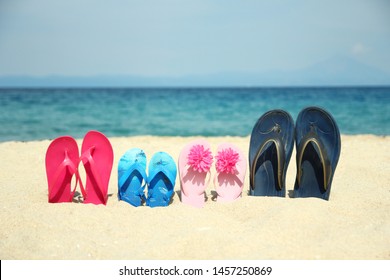 Family Slippers On Sand Beach Images 