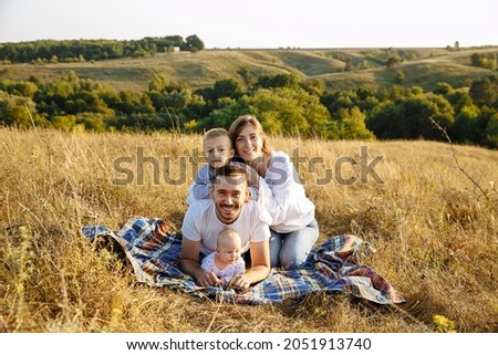 Similar – Family totem play outfoor happy in spring