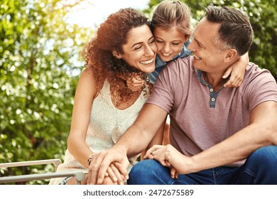 Family, smile and child hug outdoor with bonding, care or support for security trust at home backyard in summer. Woman, man and girl for embrace moment, love and sunshine vacation of childhood memory - Powered by Shutterstock