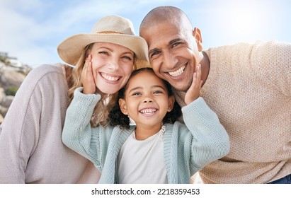 Family, smile and face portrait in nature on holiday, vacation or summer trip. Diversity, travel and parents, father and mother with girl, love and care, spending quality time together and bonding. - Shutterstock ID 2218359453