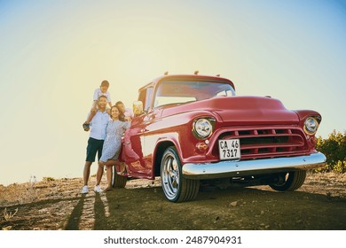 Family, smile and parents with children for adventure, road trip and explore on holiday, weekend or vacation. Travel, vintage pickup truck and mother, father and kids for journey and bonding together - Powered by Shutterstock