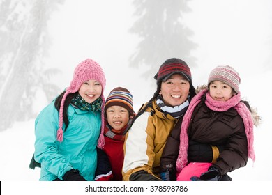 Family In The Snow