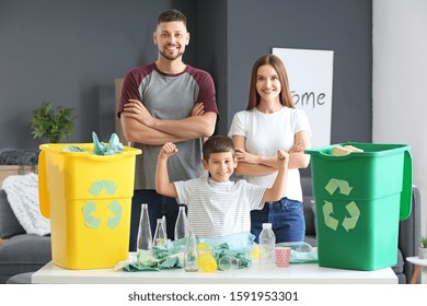 Family Sorting Garbage At Home. Concept Of Recycling