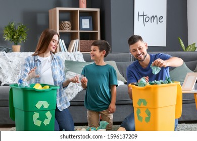 Family Sorting Garbage At Home. Concept Of Recycling