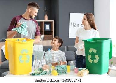 Family Sorting Garbage At Home. Concept Of Recycling