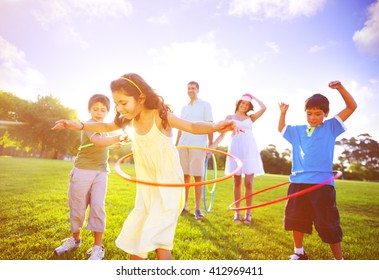 Family Spending Quality Time In The Park. 