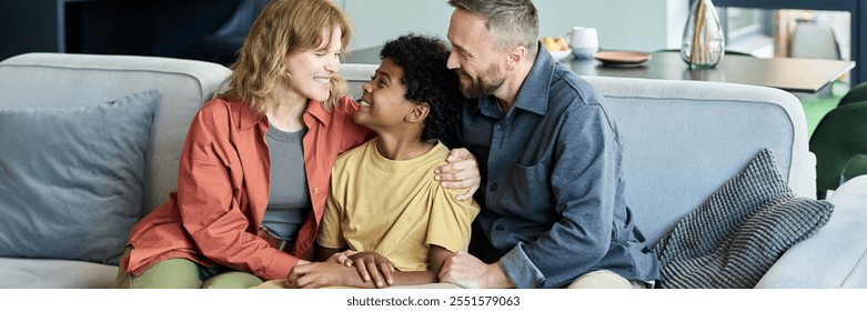 Family spending quality time together on a cozy couch with warm smiles and embracing each other, showing loving and joyful expressions during their bonding moments - Powered by Shutterstock