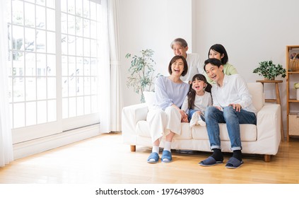 Family Spending Time Happily In The Room