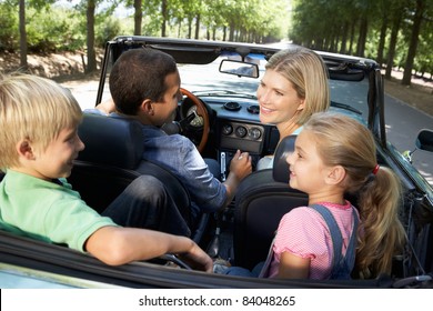 Family In Sports Car