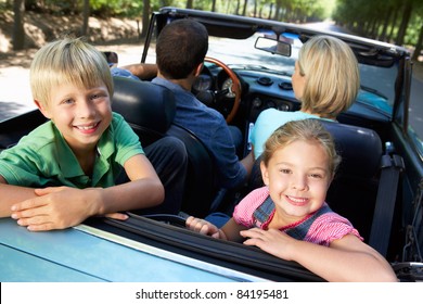 Family In Sports Car