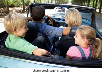 Family In Sports Car