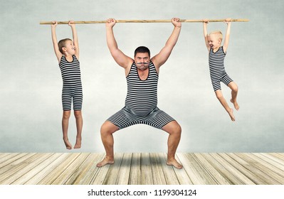 Family of strongman. The father of two sons in vintage costume of athletes perform strength exercises. Family look.