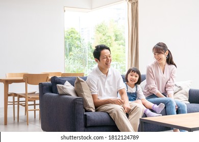 Family Talking In The Living Room