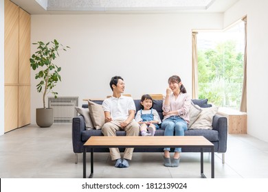 Family Talking In The Living Room