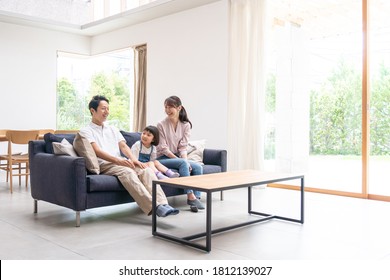 Family Talking In The Living Room