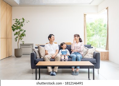 Family Talking In The Living Room