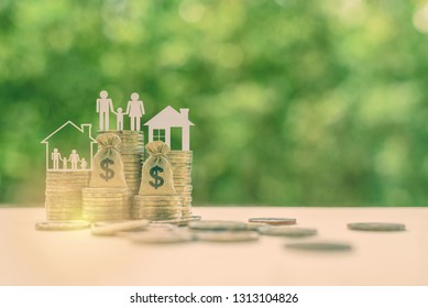 Family tax benefit / residential property or estate tax concept : Family members, house, dollar money bags on rows of rising coins, depicts home equity loan, reverse mortgage, basic needs for living - Shutterstock ID 1313104826