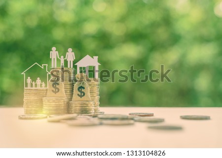 Family tax benefit / residential property or estate tax concept : Family members, house, dollar money bags on rows of rising coins, depicts home equity loan, reverse mortgage, basic needs for living
