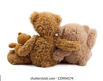 Family of teddy bears holding in one's arms