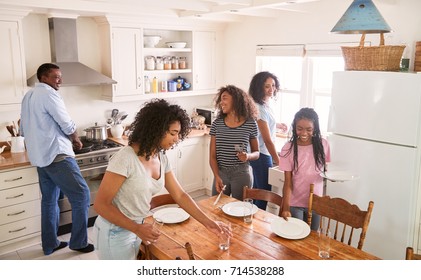 Family Teenage Daughters Laying Table Meal Stock Photo 714538288 ...