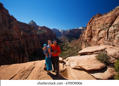 Family With Their Baby Son Visit Zion National Park In Utah, USA